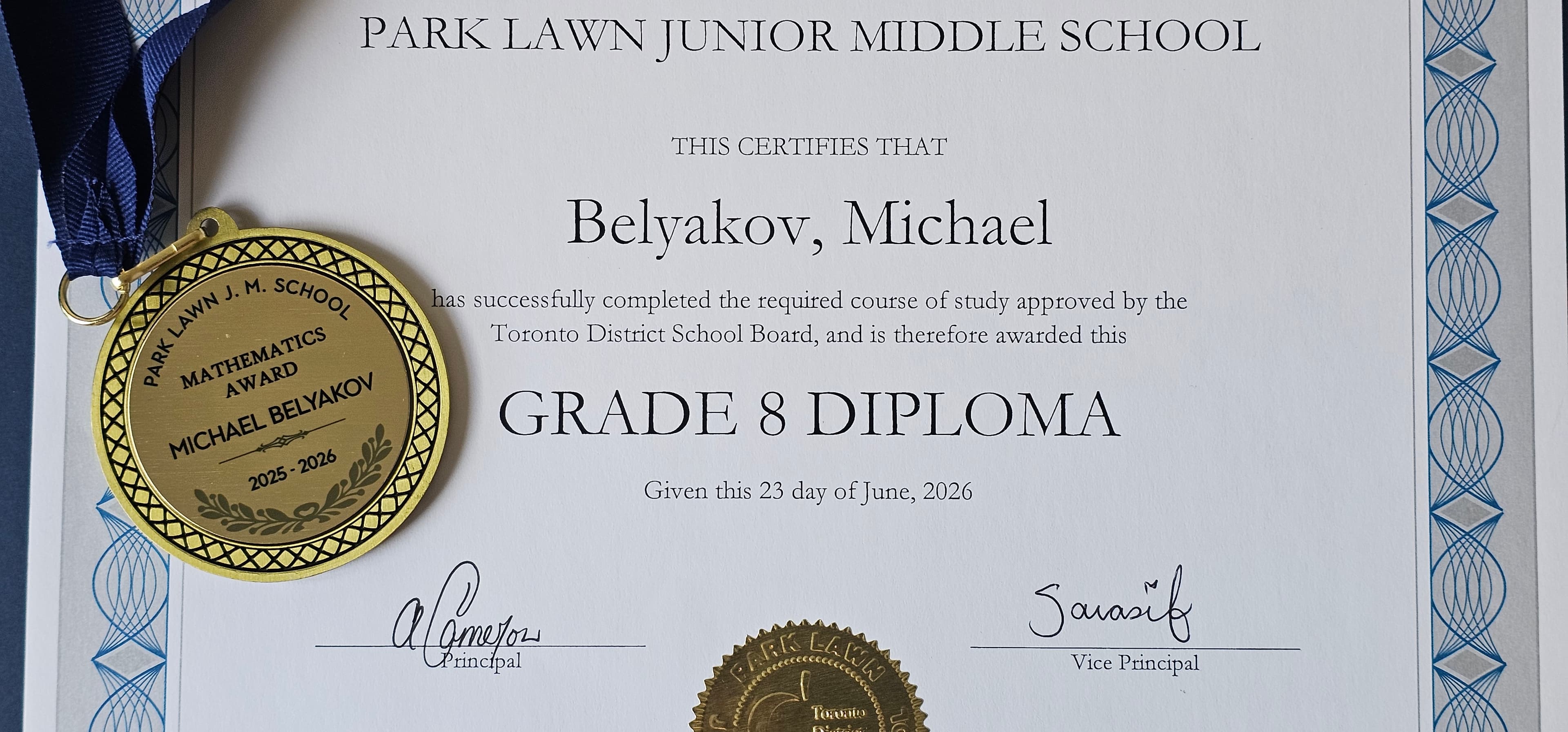 Michael Belyakov's Grade 8 diploma and gold mathematics award medal from Park Lawn Junior Middle School.