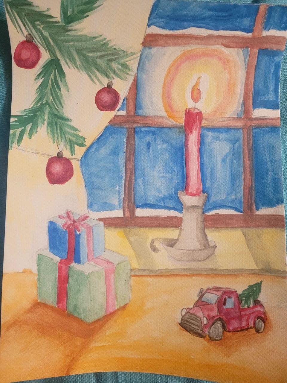 Watercolor of a lit candle, stacked presents, and a red truck carrying a tree.